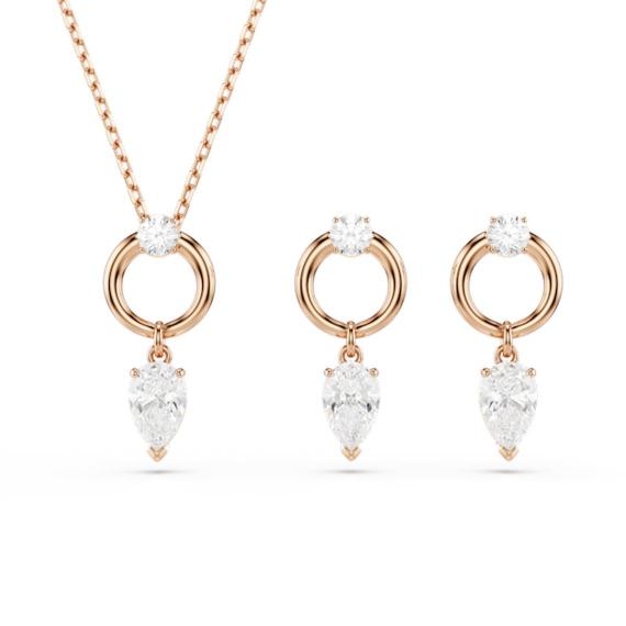 Swarovski Mesmera jewelry set with pear and round cut white stones in rose gold-tone plating, featuring elegant, sparkling design.