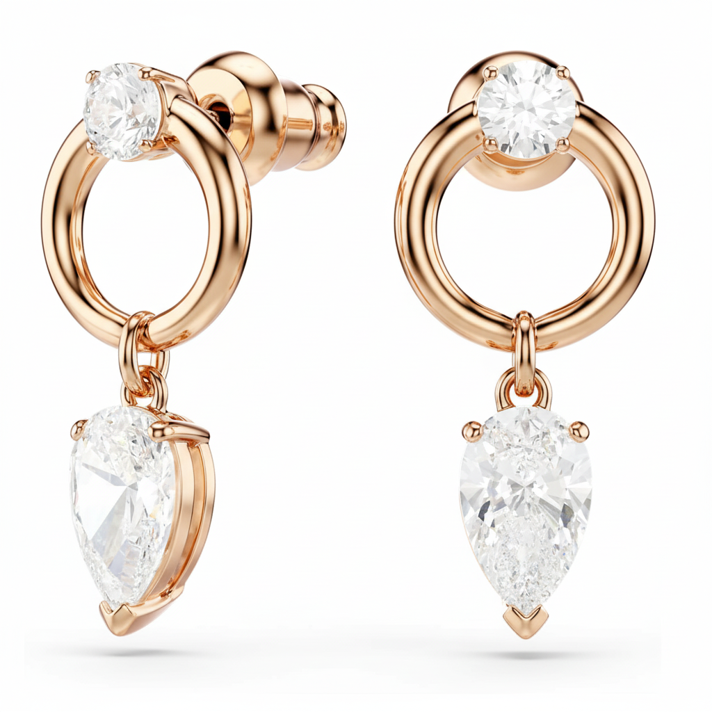 Swarovski Mesmera jewelry set with pear and round cut white crystals in rose gold-tone plating, elegant and sparkling.