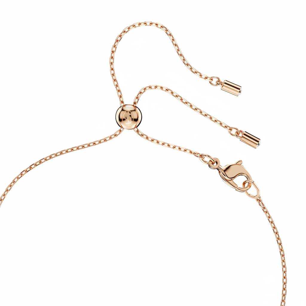 Swarovski Mesmera jewelry set with pear and round cut white stones in rose gold-tone plating, elegant and sparkling.