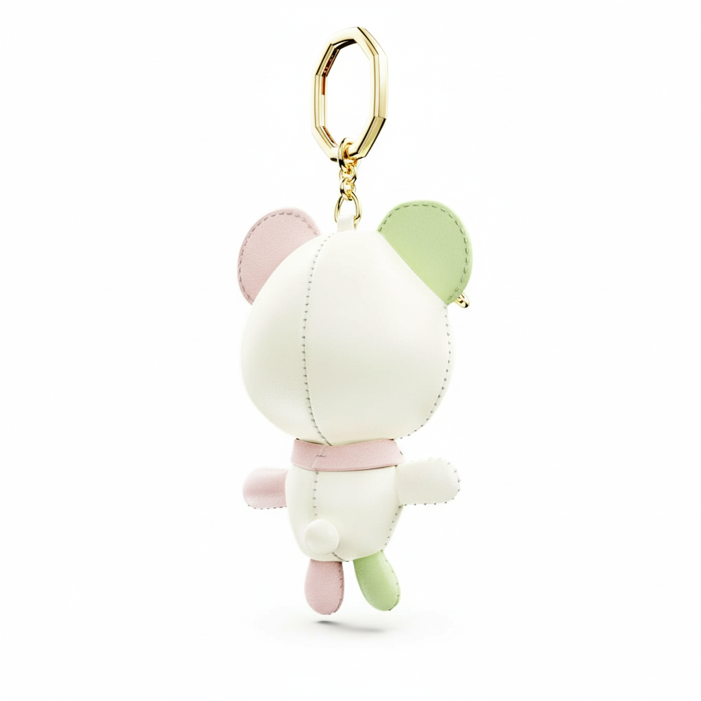 Swarovski Teddy bag charm bear with multicolored crystals and gold-tone plating, featuring a cute, detailed bear design.