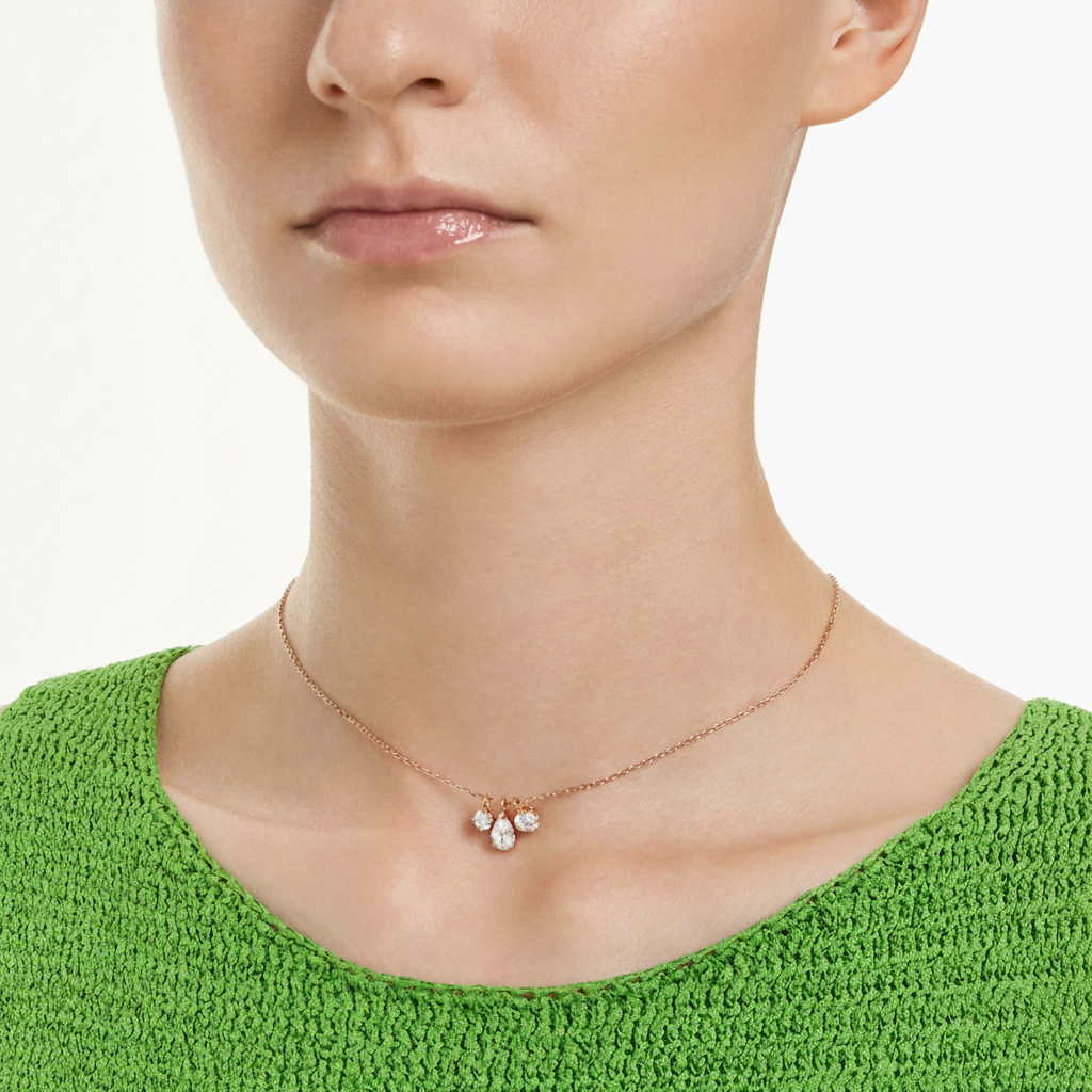 Swarovski Mesmera pendant in white with rose gold tone plating, featuring a sparkling crystal design and elegant chain.