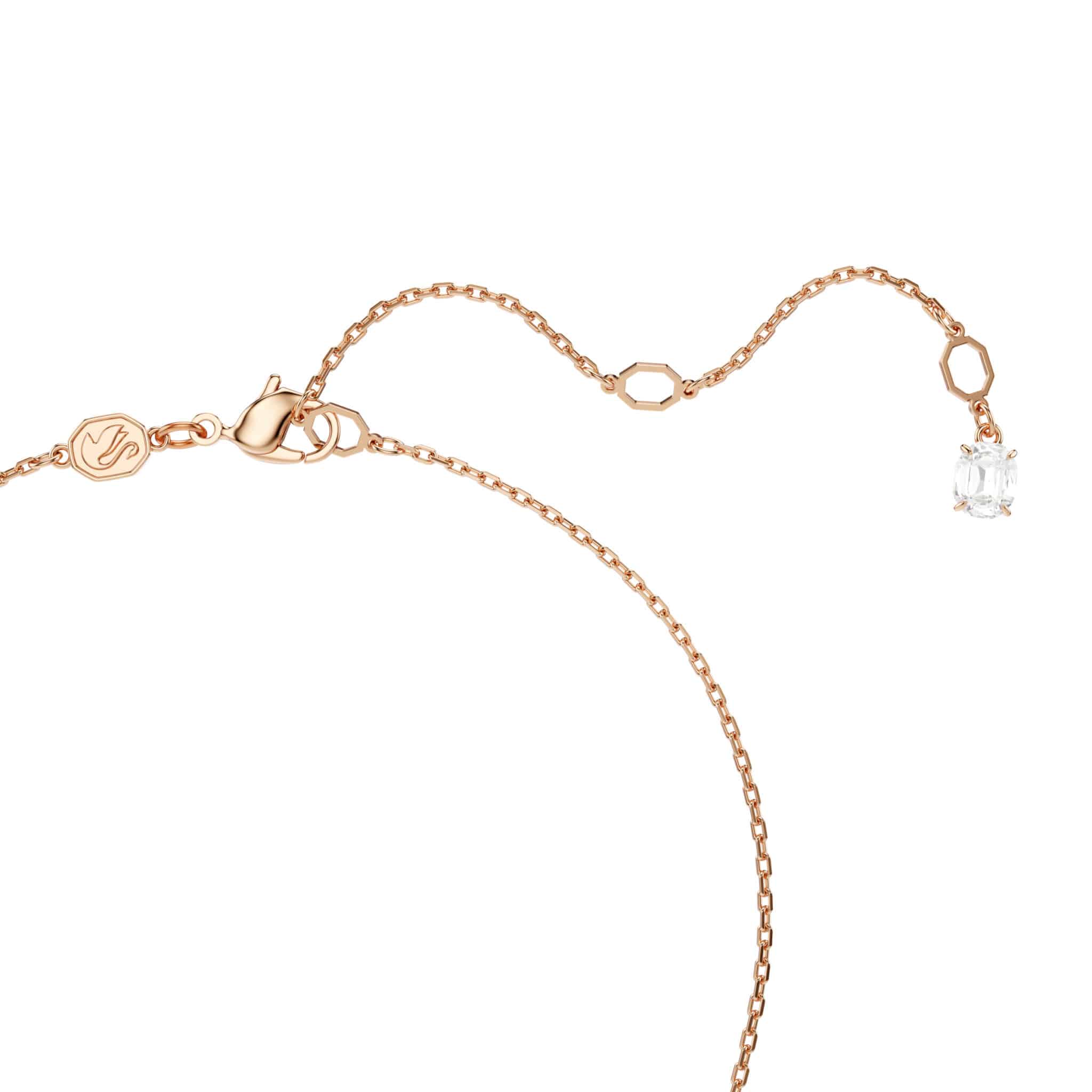Swarovski Mesmera jewelry set with white crystals and rose gold tone plating, including necklace and matching earrings.