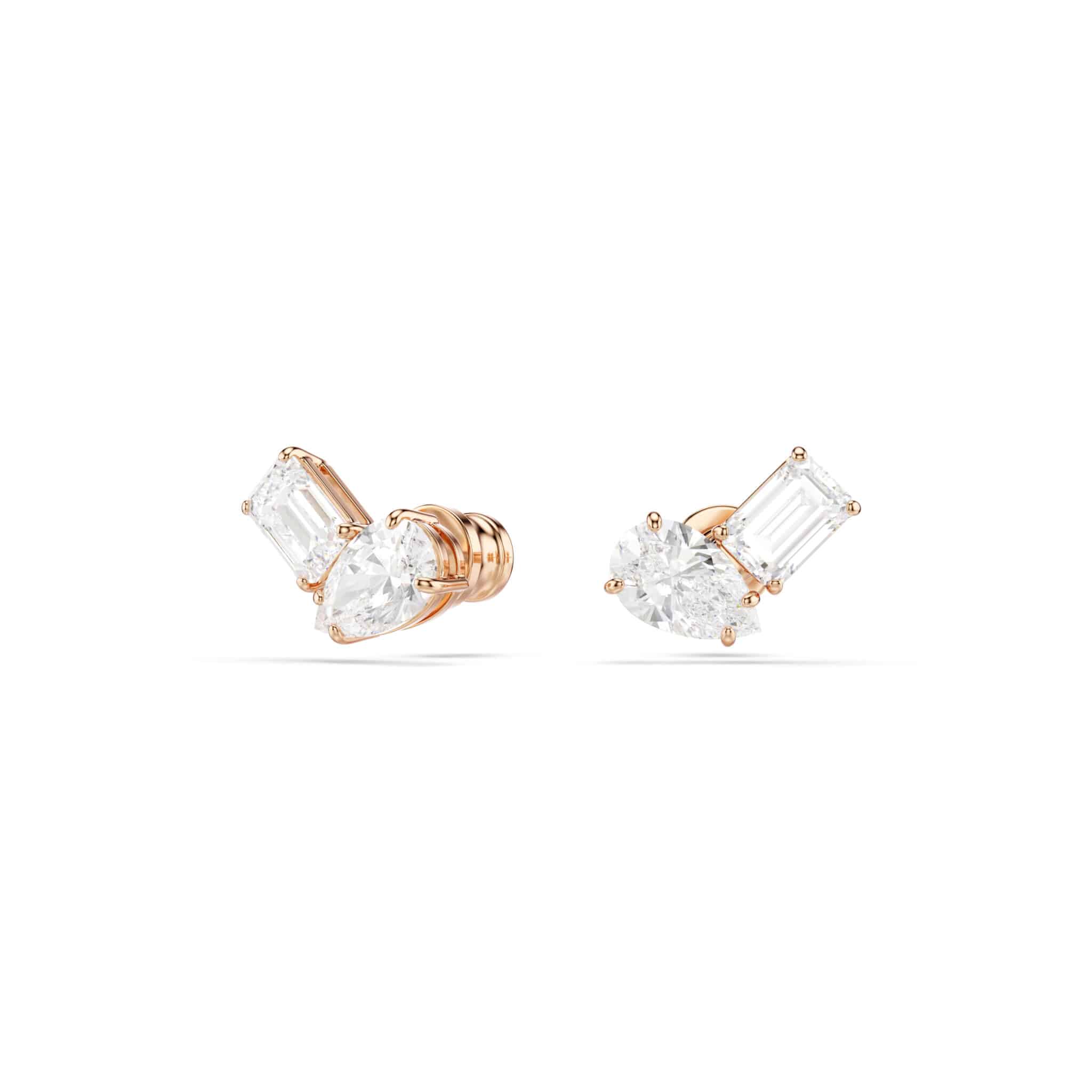 Swarovski Mesmera jewelry set with white stones and rose gold tone plating, including earrings and a matching necklace.