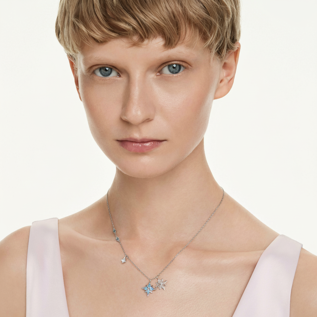 Swarovski Symbolica pendant in blue with rhodium plating, featuring a detailed, elegant jewelry design on a chain.