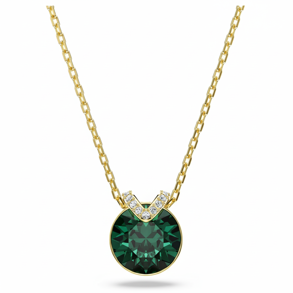 Swarovski Bella V pendant with round green crystal, gold-tone plated, elegant jewelry piece with sparkling gemstone highlights.