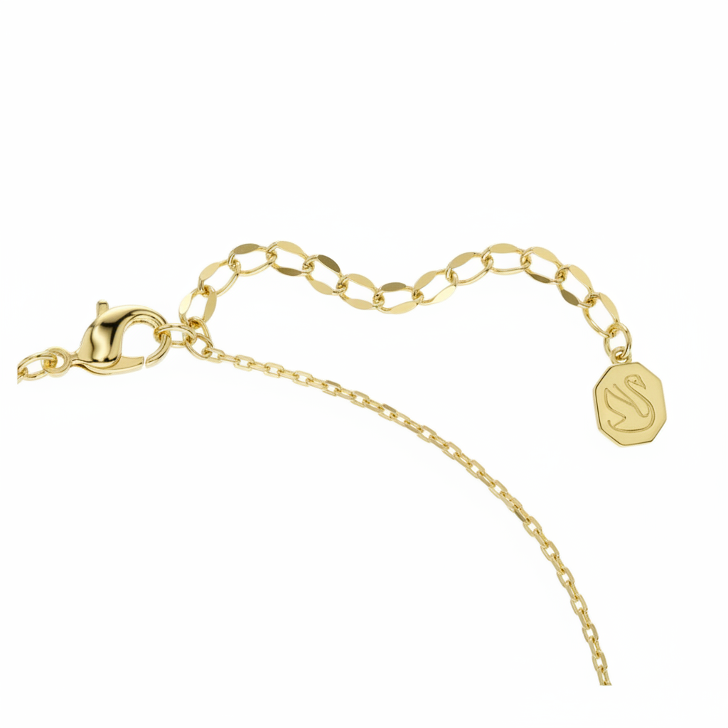 Swarovski Bella V pendant with round green crystal, gold-tone plated jewelry piece showcasing elegant design and sparkling gemstone.