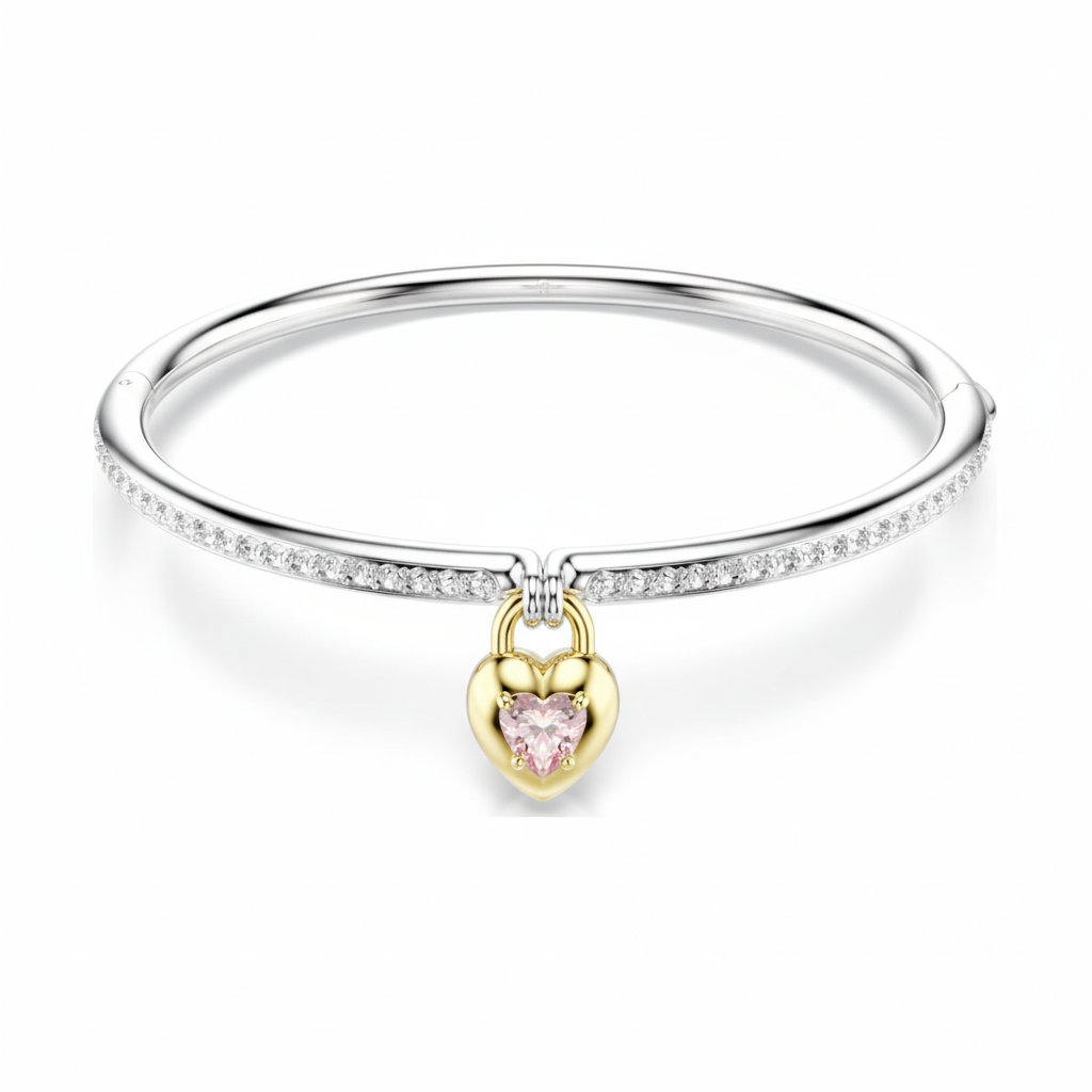 Swarovski Idyllia bangle with pink heart charm, mixed cuts and mixed metal finish, elegant jewelry accessory.