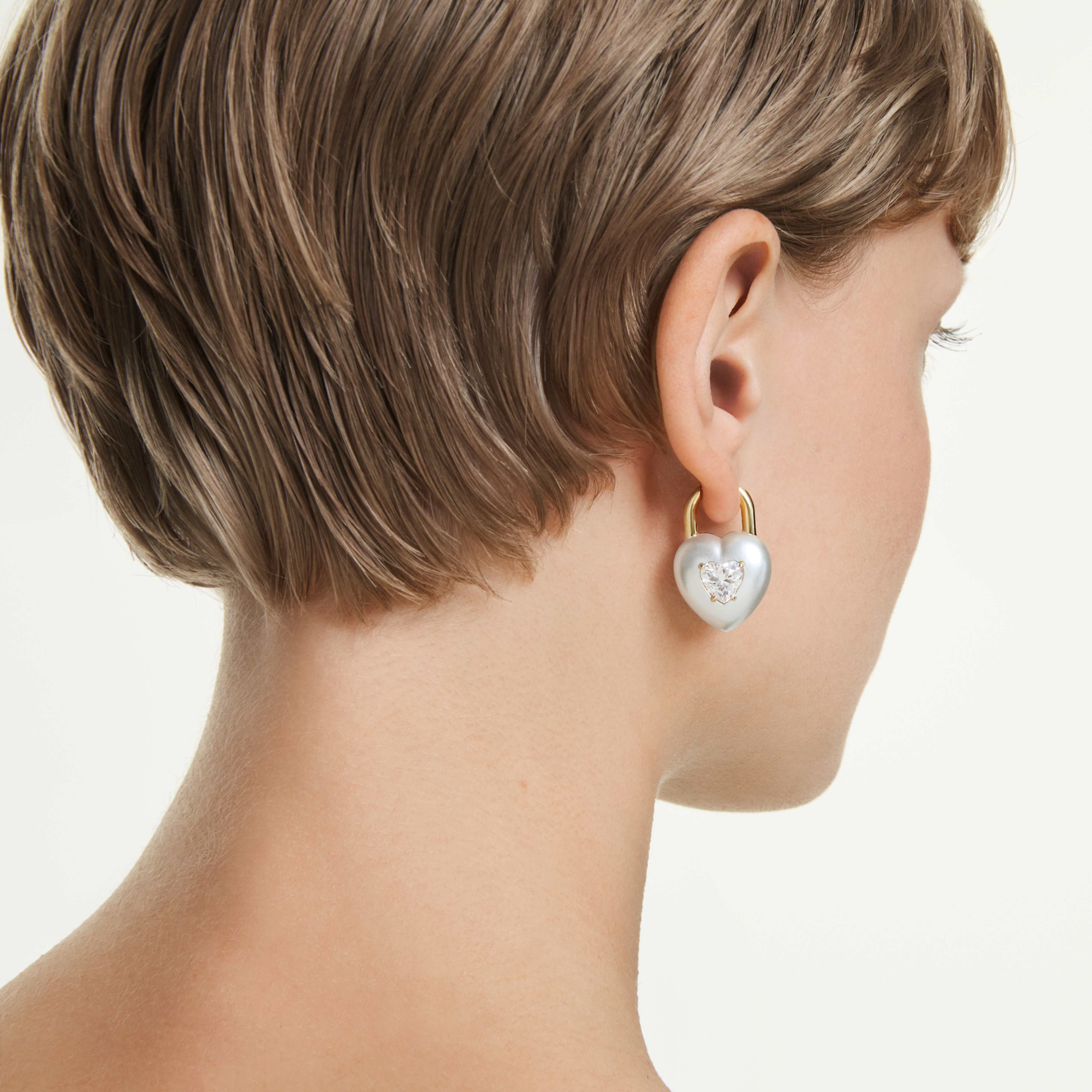 Swarovski Idyllia drop earrings with mixed cuts, heart-shaped white crystals, gold-tone plated jewelry, elegant and sparkling.