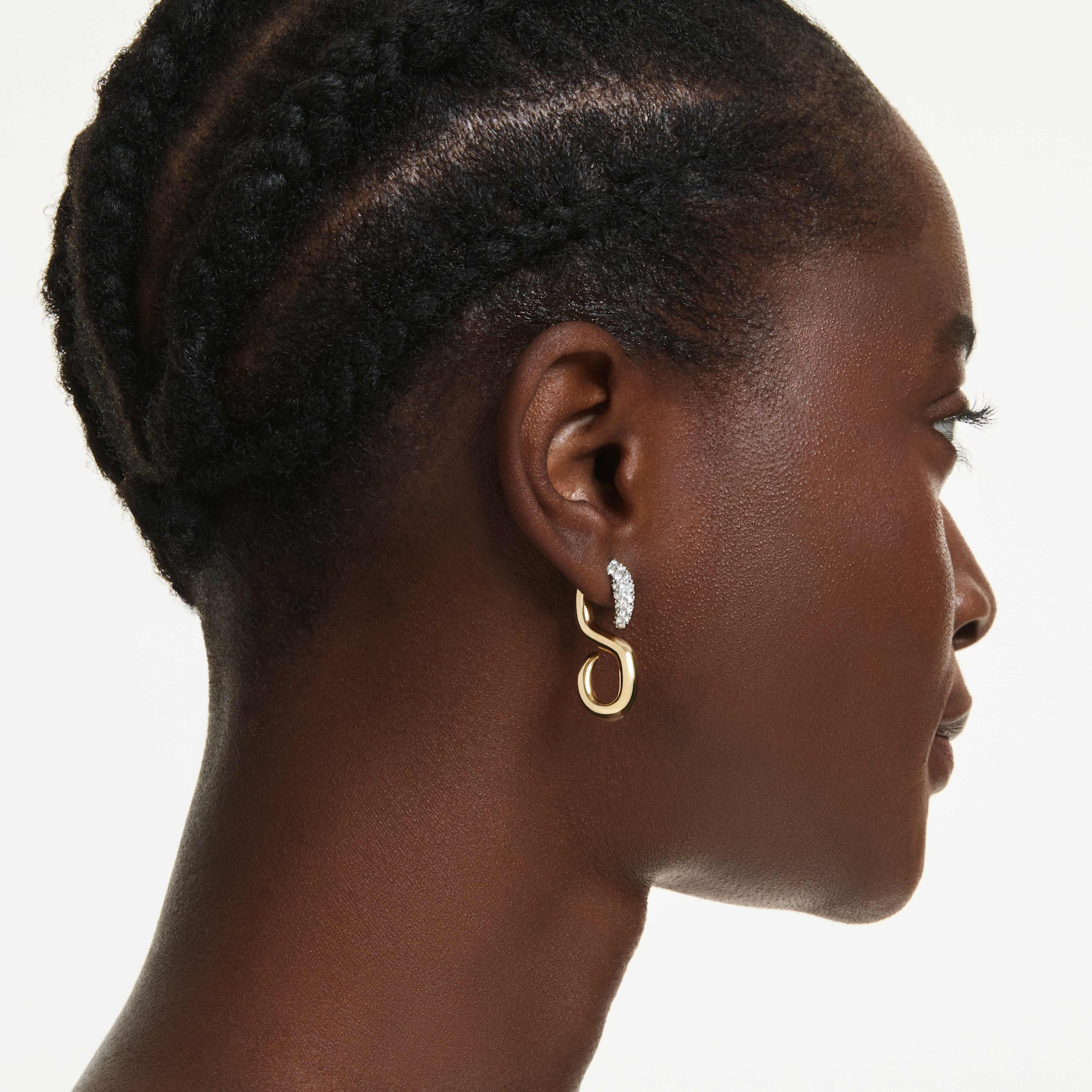 Swarovski Dextera earrings featuring round-cut white stones and mixed metal finish, elegant jewelry for special occasions.
