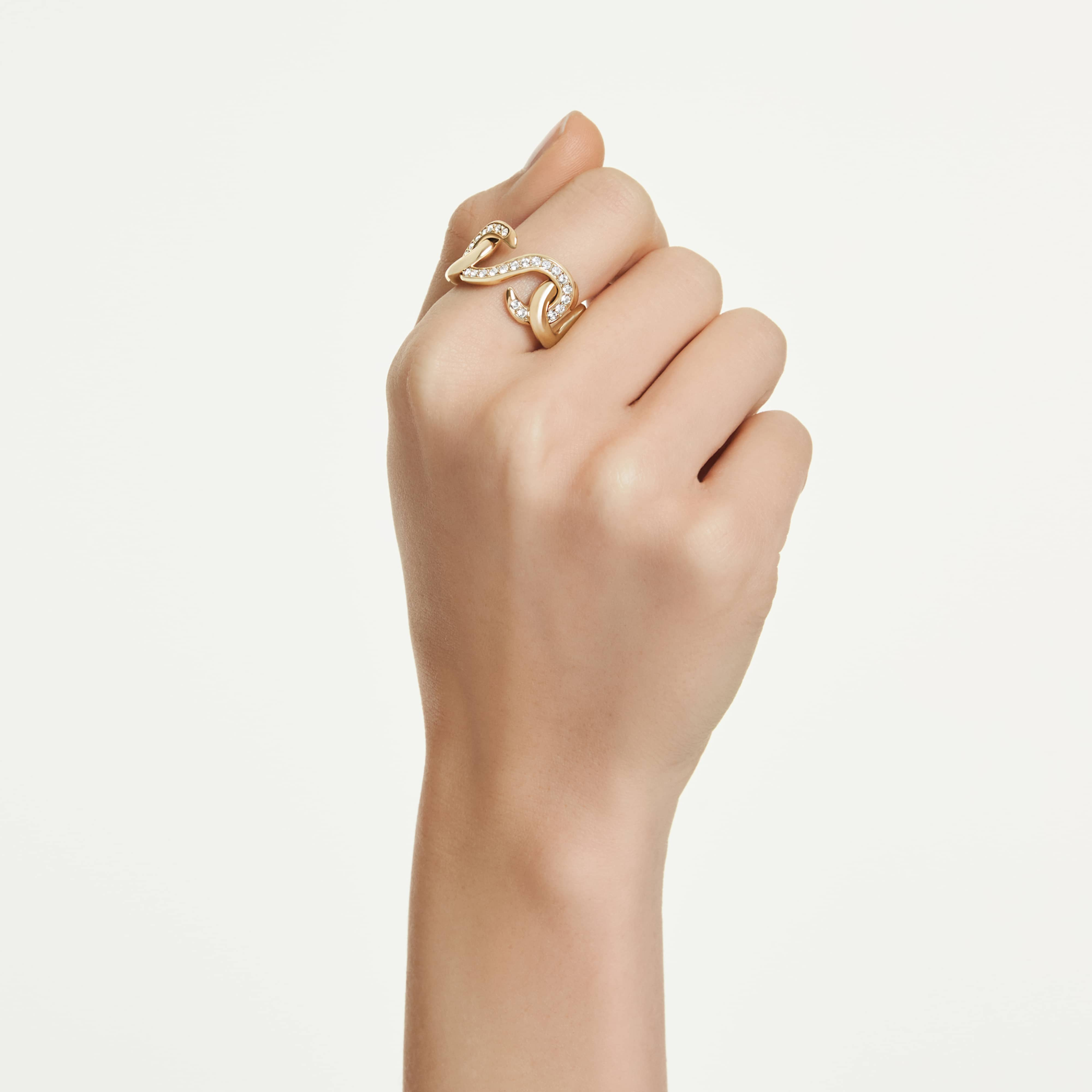 Swarovski Dextera open ring with round-cut white crystal and gold-tone plating, showcasing elegant jewelry design.