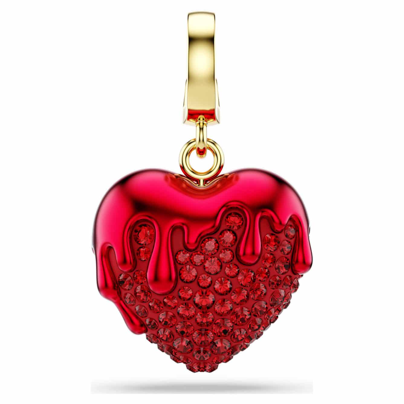 Swarovski Idyllia charm with sparkling crystal accents and intricate silver detailing on a delicate jewelry chain.