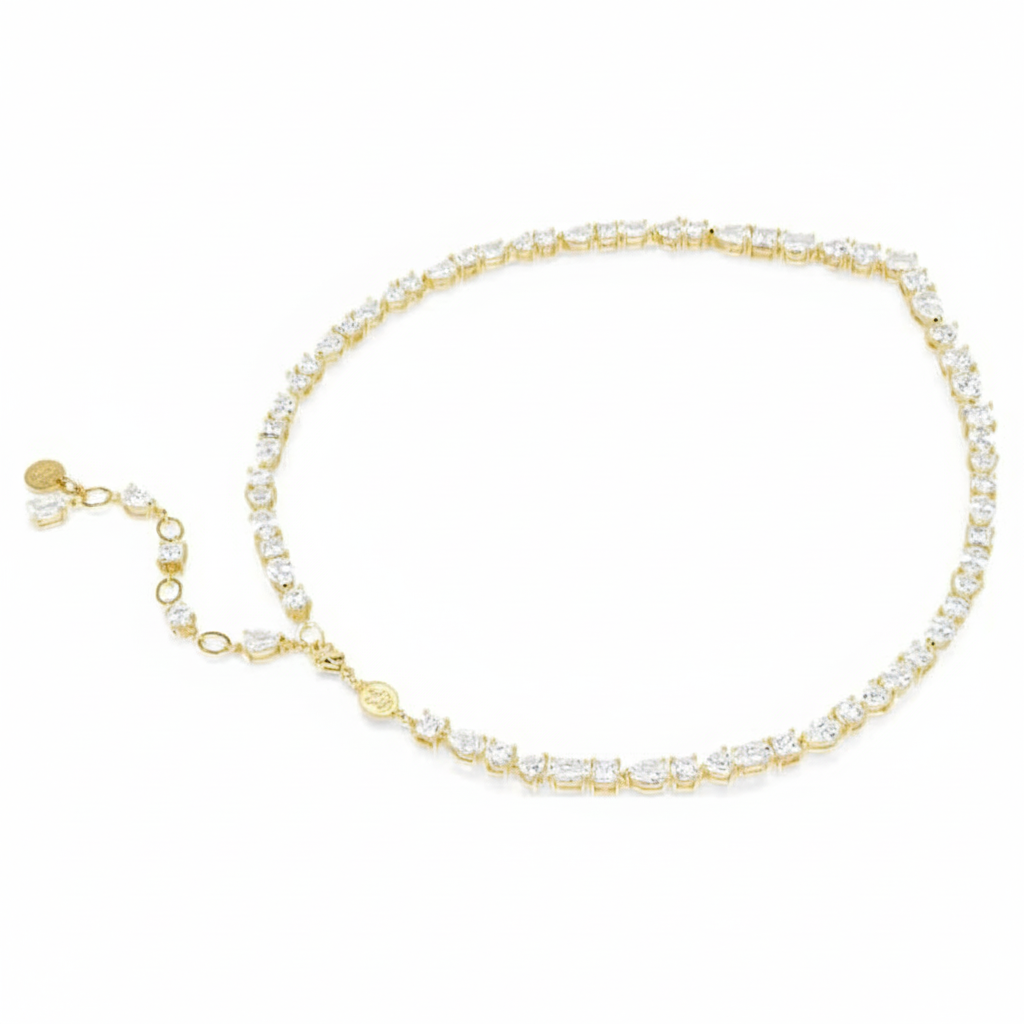 Swarovski Mesmera necklace with mixed-cut white crystals and gold-tone plated chain, elegant and sparkling jewelry piece