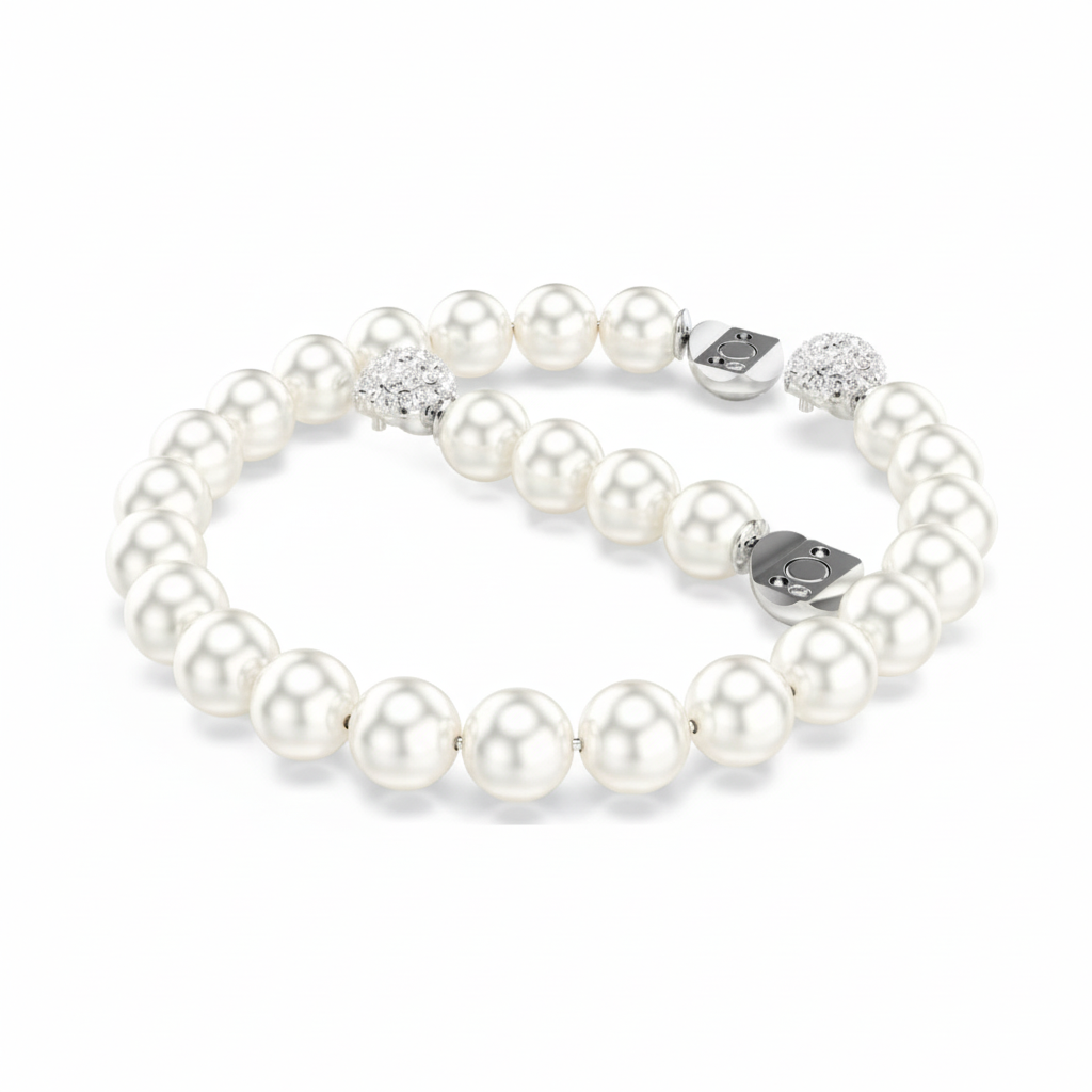 Swarovski Matrix bracelet with white crystal pearls and rhodium plating, featuring a sleek, modern design.
