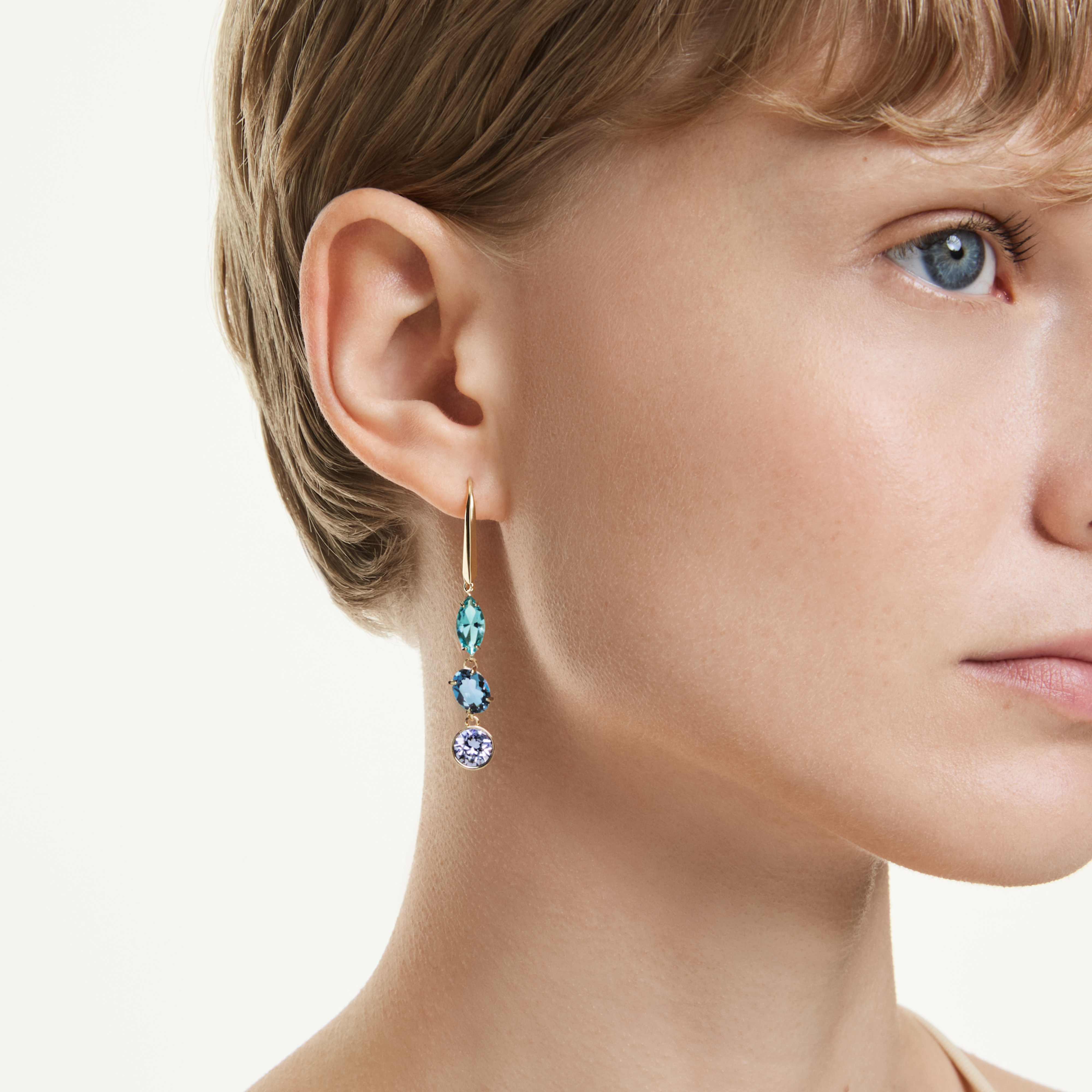 Swarovski Gema Drop Earrings with asymmetrical design, multicolored crystals, and gold-tone plating.