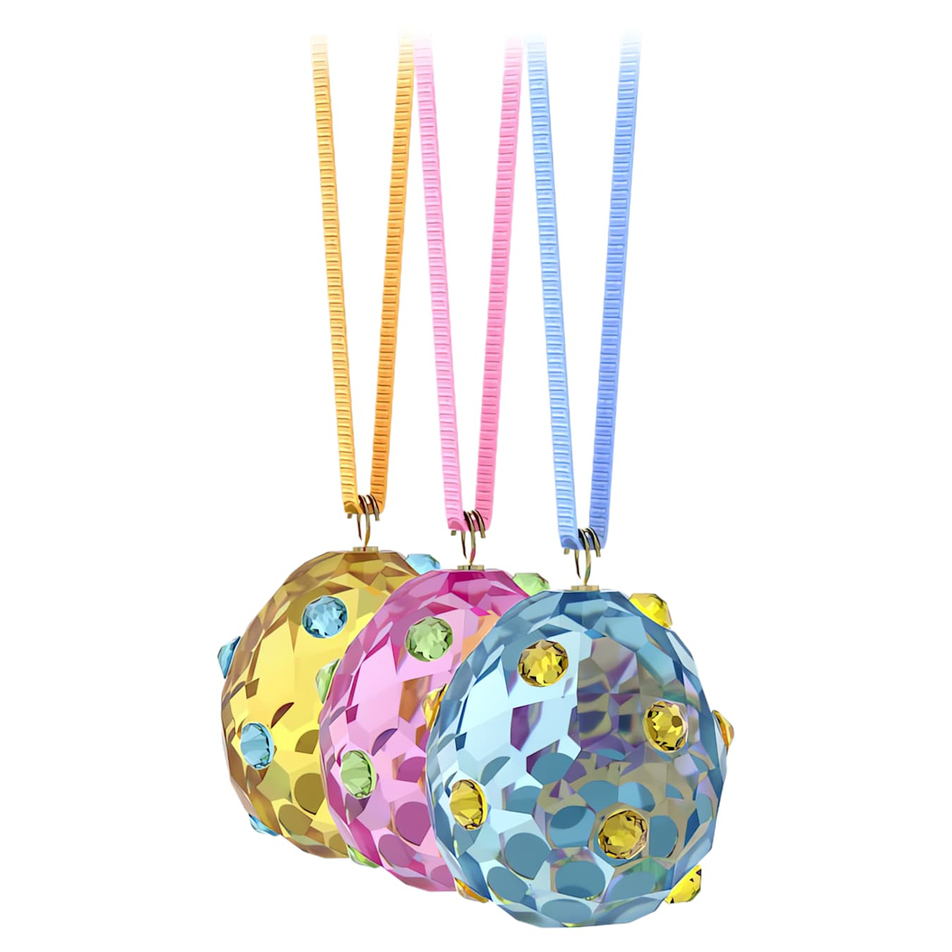 Swarovski Idyllia Eggs Ornament Set featuring delicate crystal eggs with intricate designs on a white background.