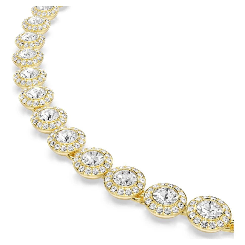 Swarovski Una Angelic jewelry set featuring three round cut white crystals with gold-tone plated accents.