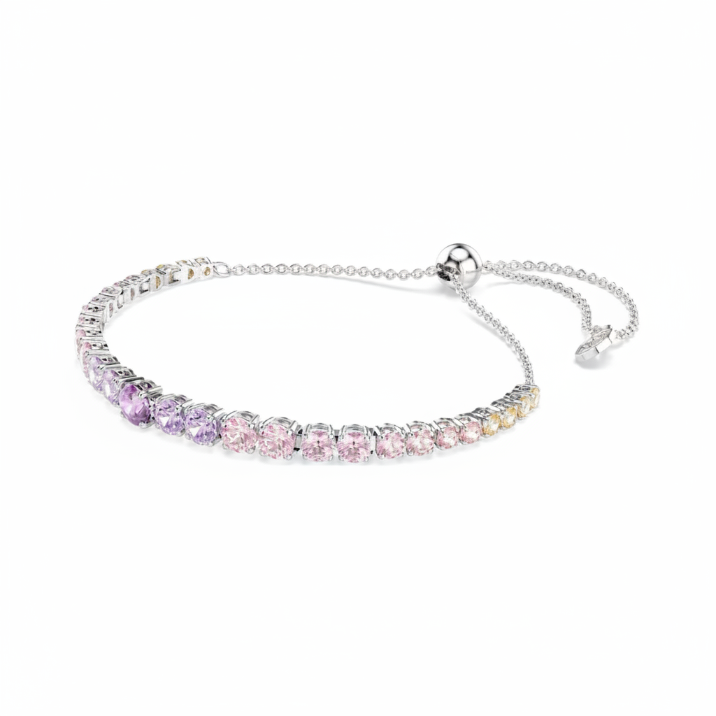 Swarovski Matrix tennis bracelet with multicolored round cut crystals in a gradient pattern, rhodium plated for a sleek finish.