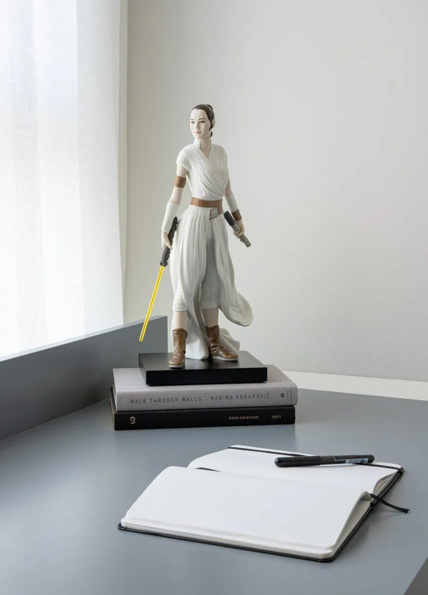 Lladro Rey™ sculpture featuring a detailed porcelain figure of a regal king with a crown and flowing robes.