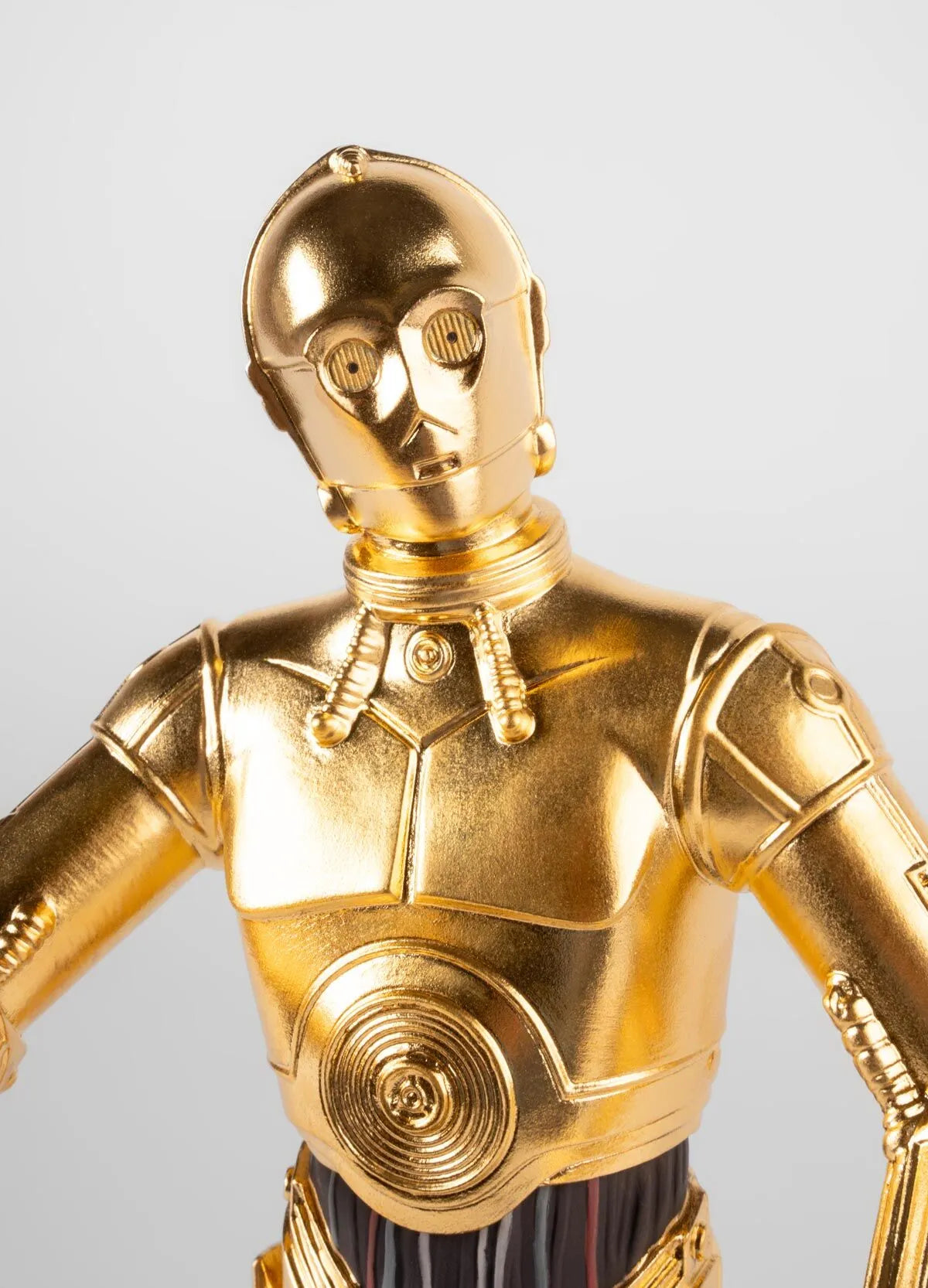 Lladro C3PO™ sculpture depicting the iconic robot character in detailed, polished ceramic finish.