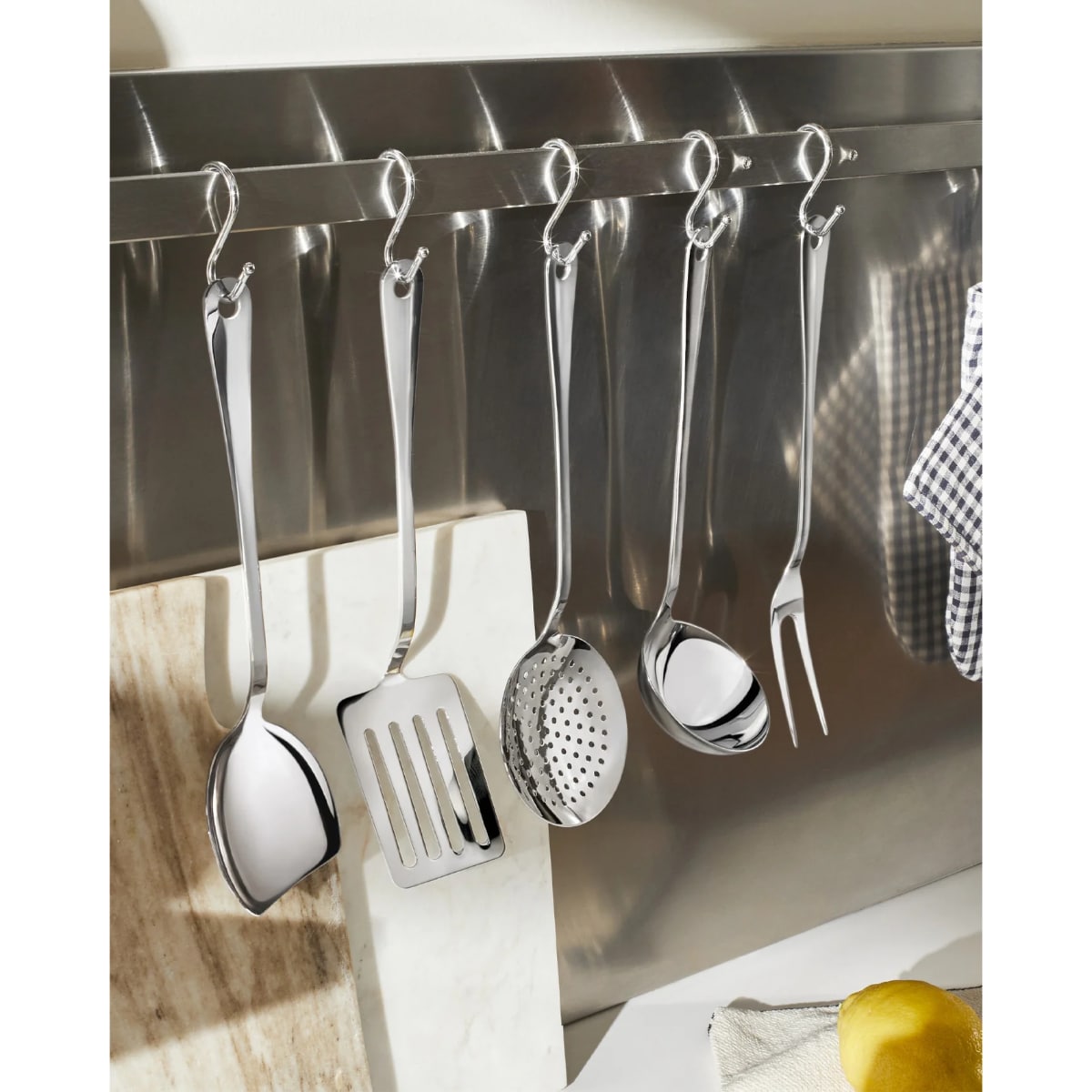 Alessi Morrison kitchen set featuring stylish utensils and accessories with sleek, modern design in a coordinated collection.