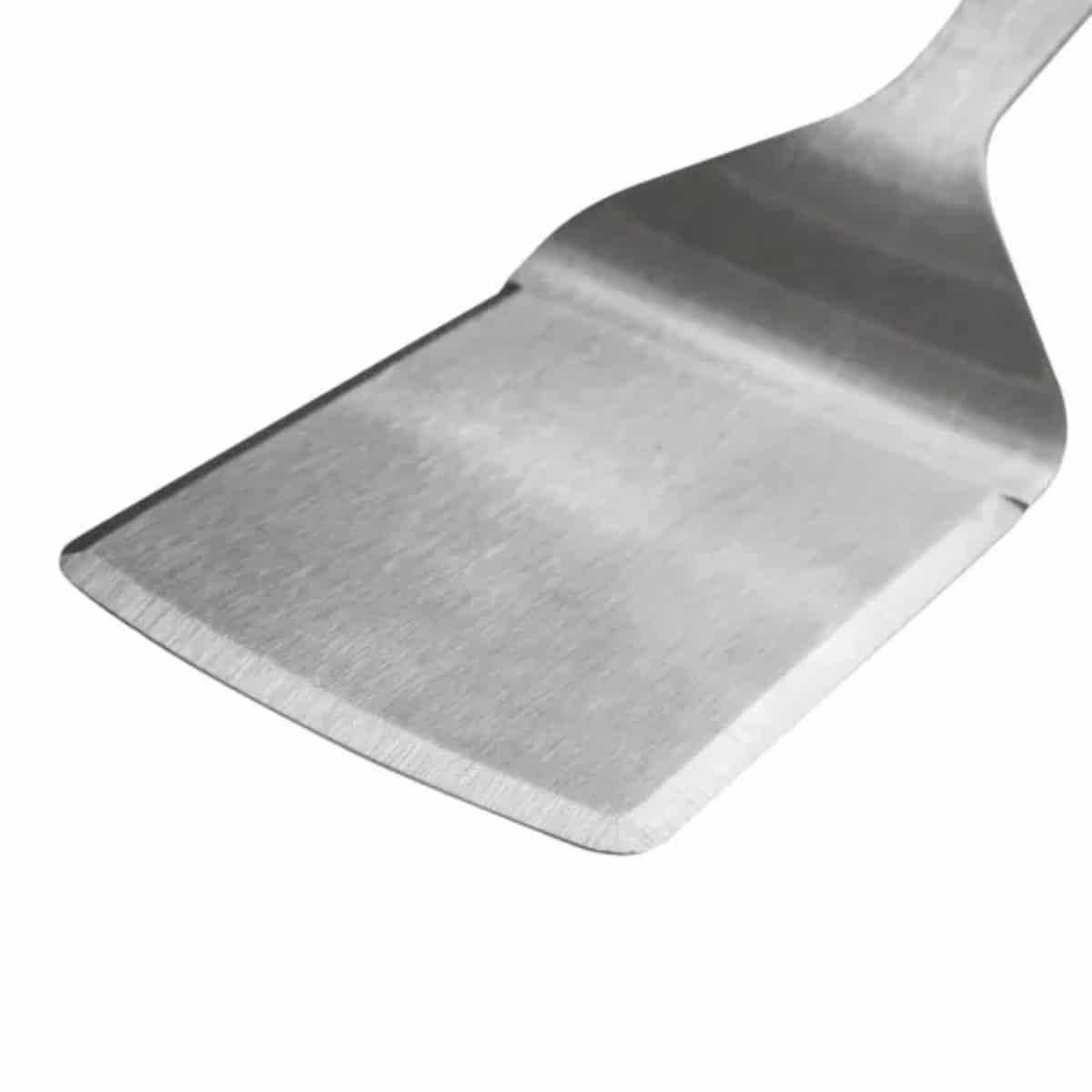Traeger BBQ spatula with black handle and slotted blade, ideal for grilling and flipping food on a barbecue grill.