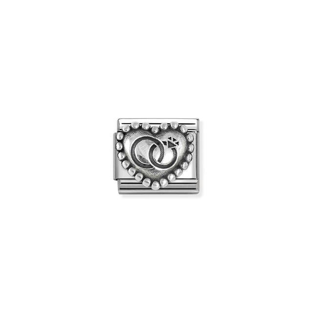 Nomination Composable wedding rings with heart and dot symbols, showcasing a close-up of the elegant jewelry design.