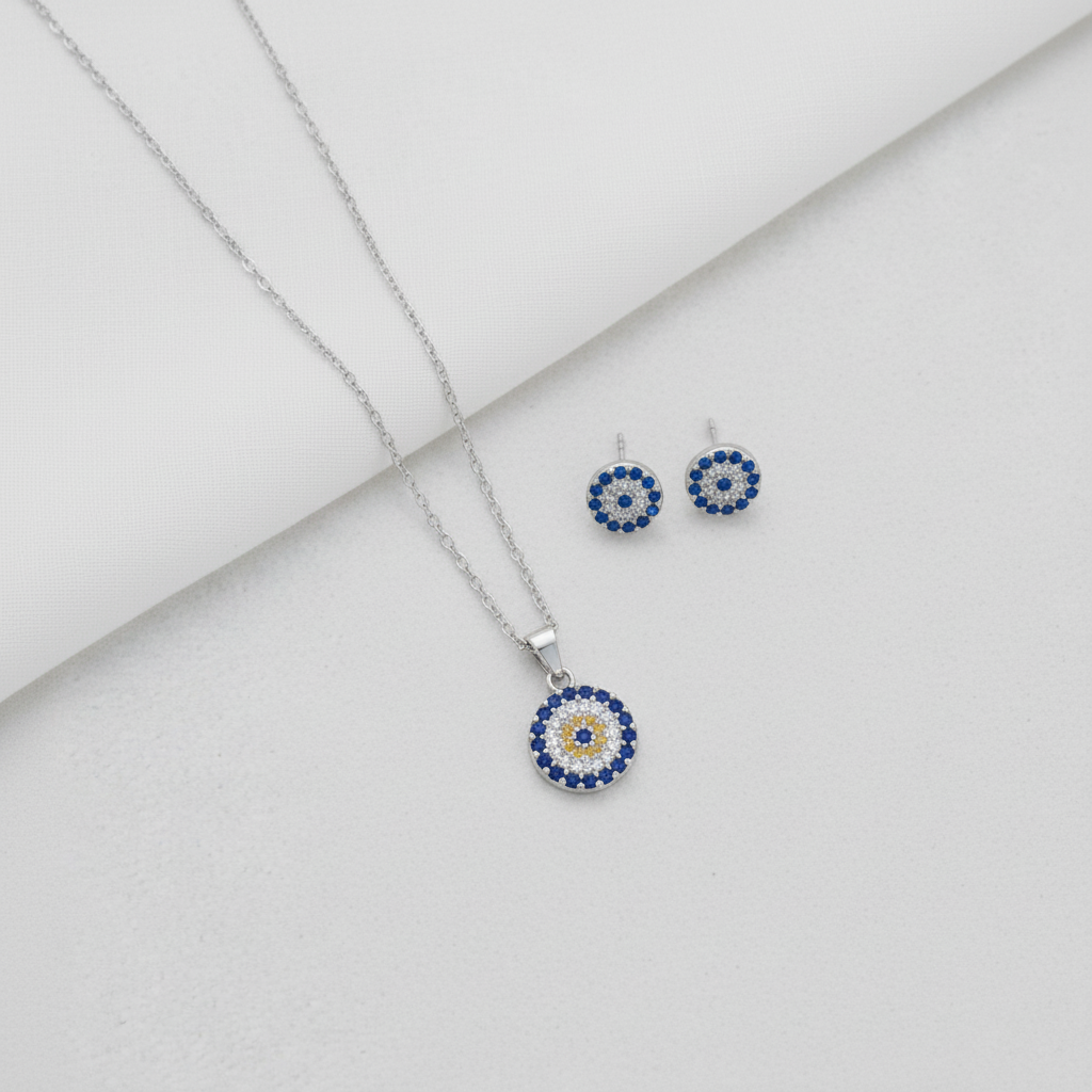 MISU 925 Sterling Silver Evil Eye earrings and necklace set featuring blue and silver jewelry with intricate evil eye designs.