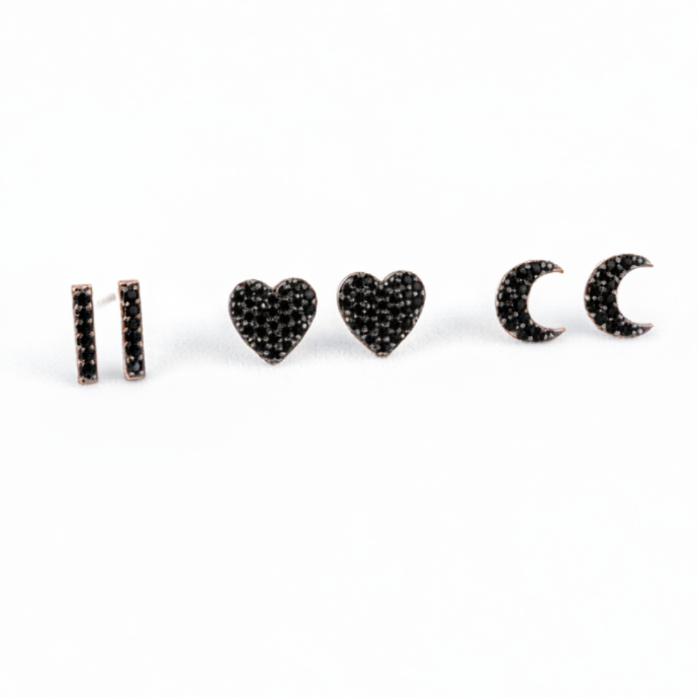 Set of three MISU 925 Sterling Silver Midnight Stud Earrings showcasing different sizes and a sleek, polished finish.
