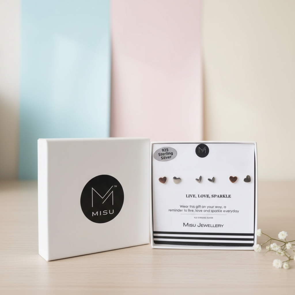 Set of three Misu 925 sterling silver hearts earrings, featuring delicate heart-shaped designs in a versatile jewelry set.
