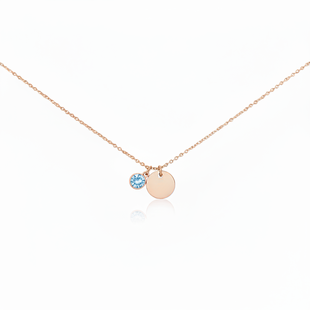 Misu Rose Gold Necklace with December Topaz birthstone pendant, elegant jewelry featuring a rose gold finish and gemstone detail.