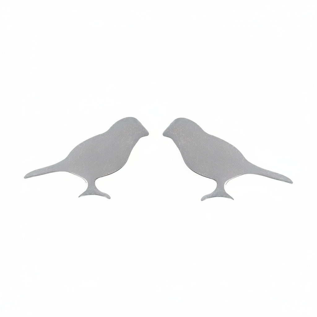 Sterling silver swallow earrings by Misu featuring delicate bird design with polished finish.