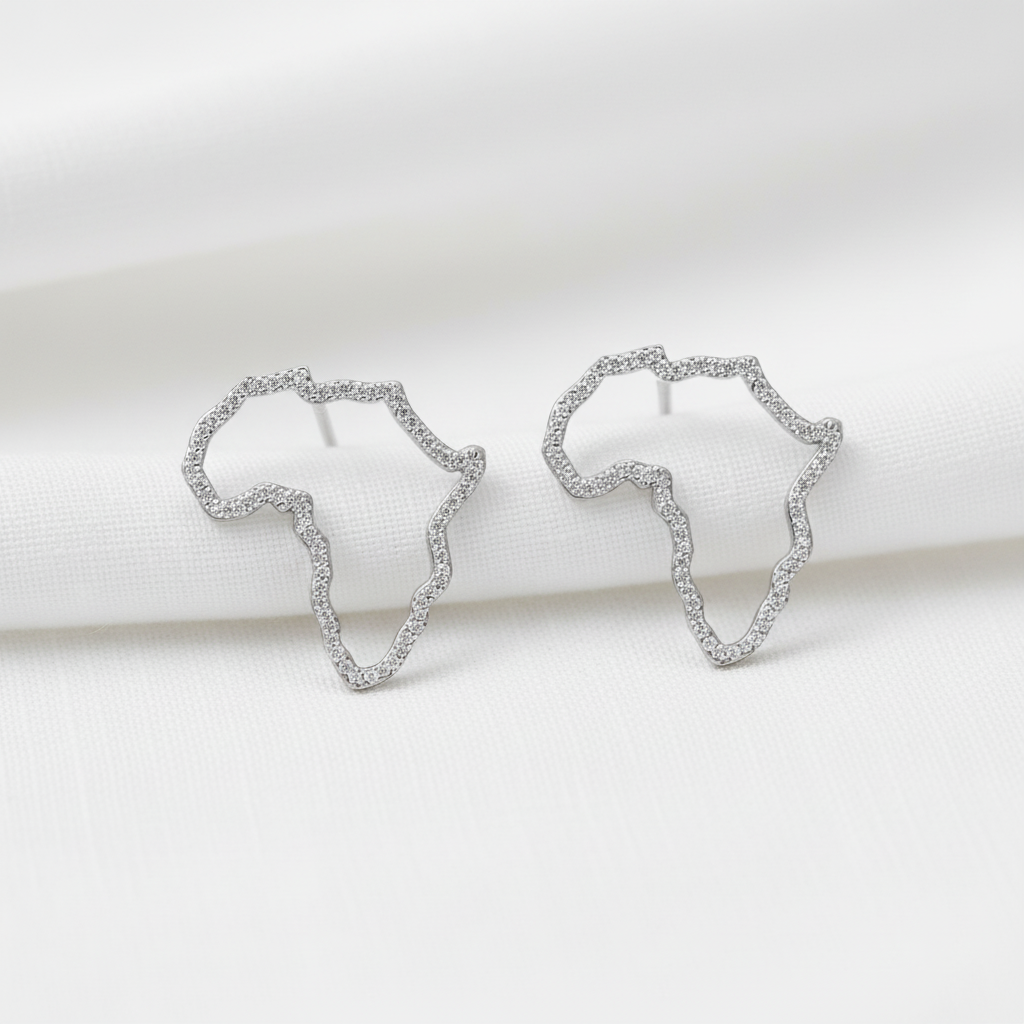 Sterling silver earrings featuring an Africa-inspired design by Misu, showcasing intricate craftsmanship and elegant detailing.