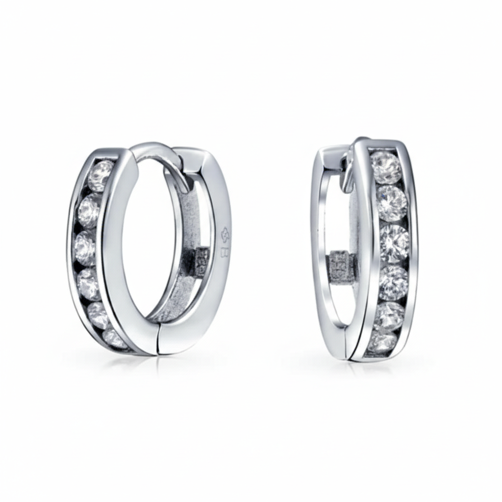 Misu 925 sterling silver huggie earrings with a sleek, minimalist design and polished finish.