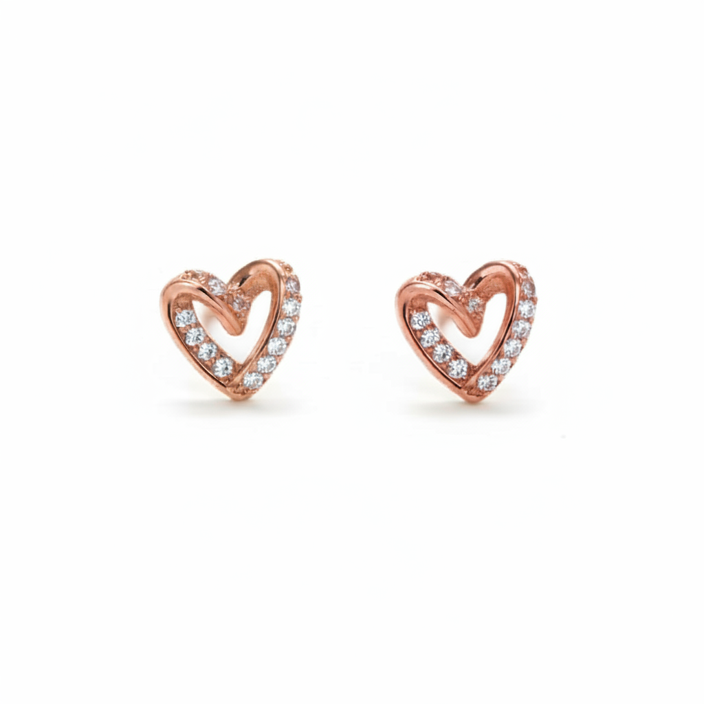 Misu Rosy Heart Stud Earrings featuring pink heart-shaped design with silver posts and butterfly backs.