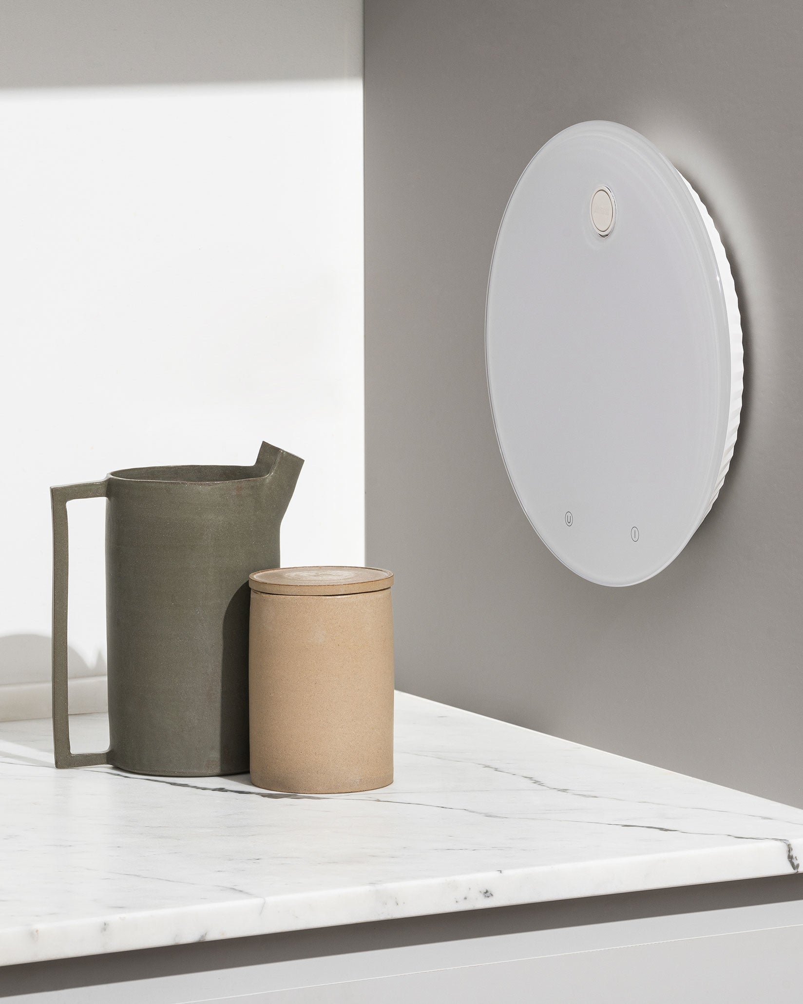White Alessi Plissé kitchen scale with textured surface and digital display, designed for precise weight measurement.