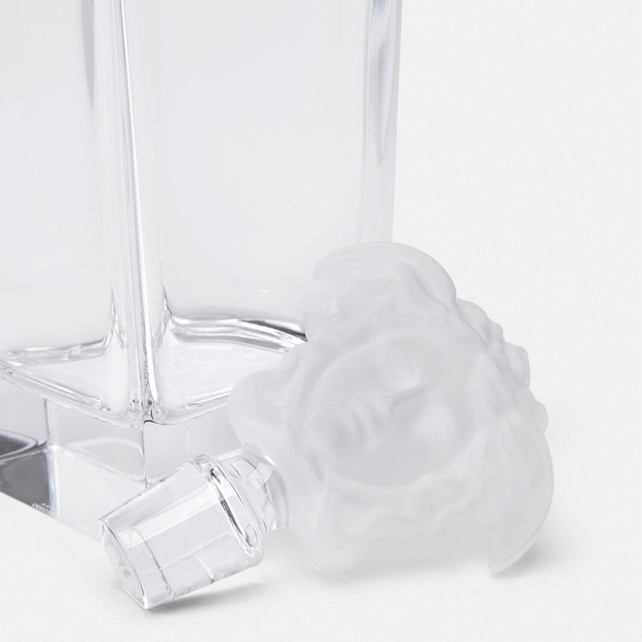 Versace Medusa Crystal Treasury decanter with intricate design and clear glass, showcasing luxury and elegance.