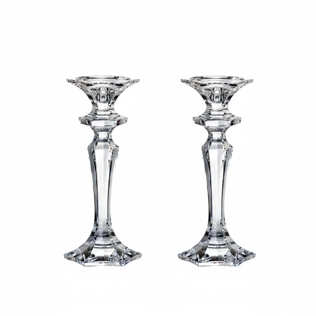 Set of two Bohemia Crystal Luxor candlesticks, 25.5cm tall, with elegant curved design and clear glass finish.