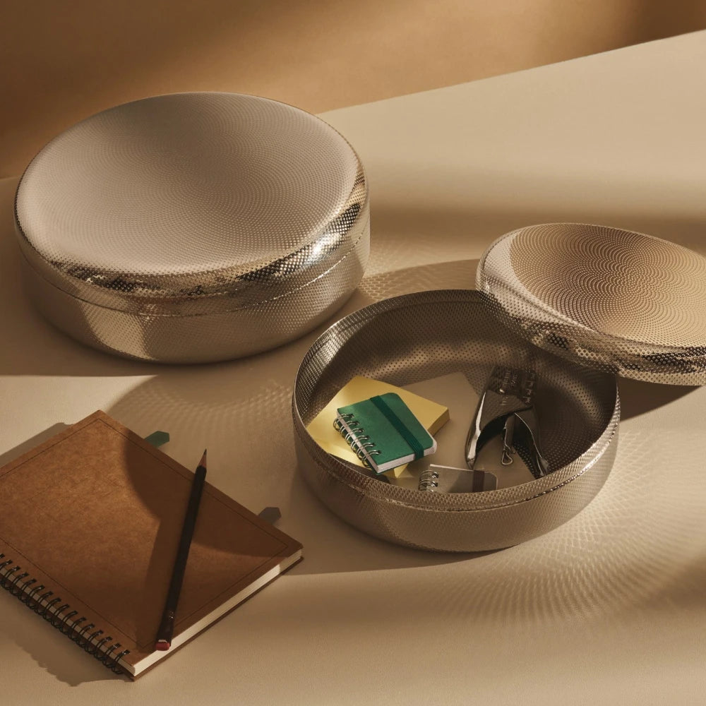 Alessi 23cm kitchen box with sleek stainless steel design and secure lid for food storage and organization.