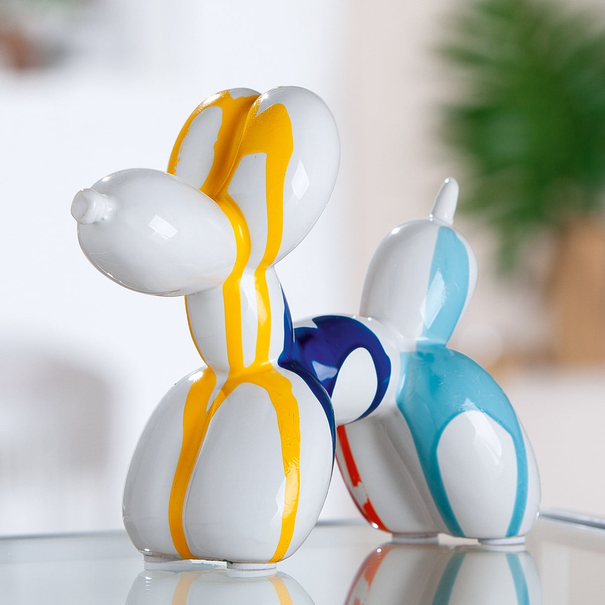 Gilde white balloon dog figure by Gilde, 15cm tall, colorful design, detailed sculpture with vibrant painted details.