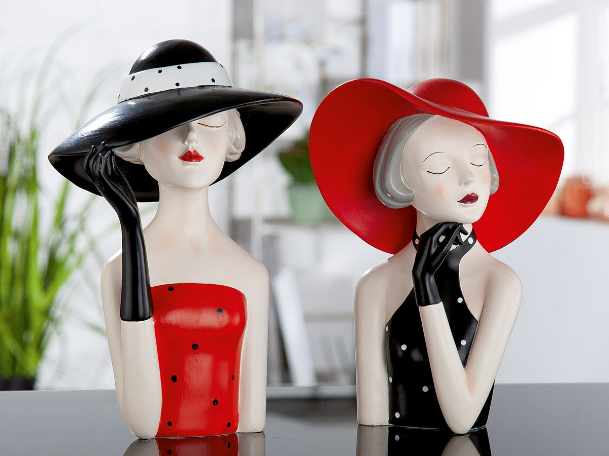 Gilde figure of a woman lady wearing a red hat with dotted pattern, detailed collectible figurine with elegant attire