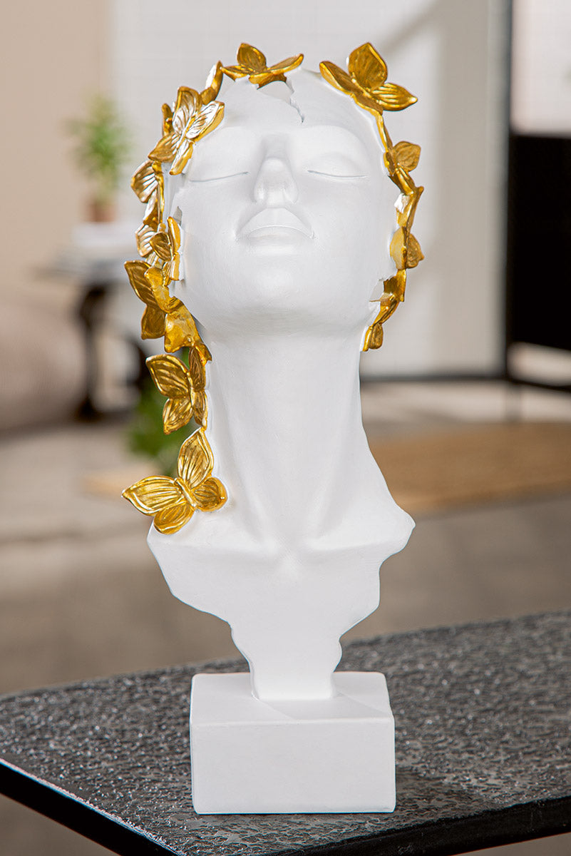 White resin Gilde woman butterfly sculpture with intricate detailing, showcasing a decorative art piece on a neutral background.