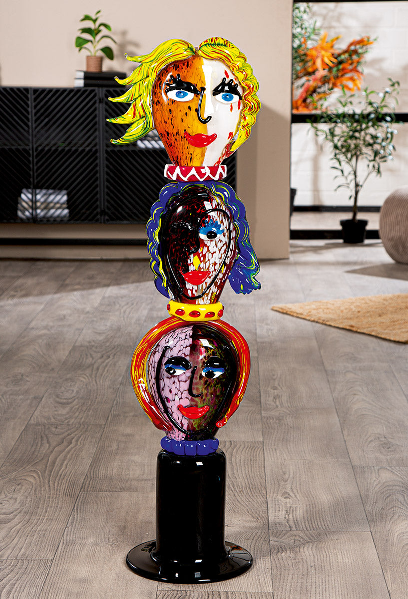 Decorative glass art sculpture featuring a head poseidos design by Gilde, showcasing intricate details and a modern artistic style.