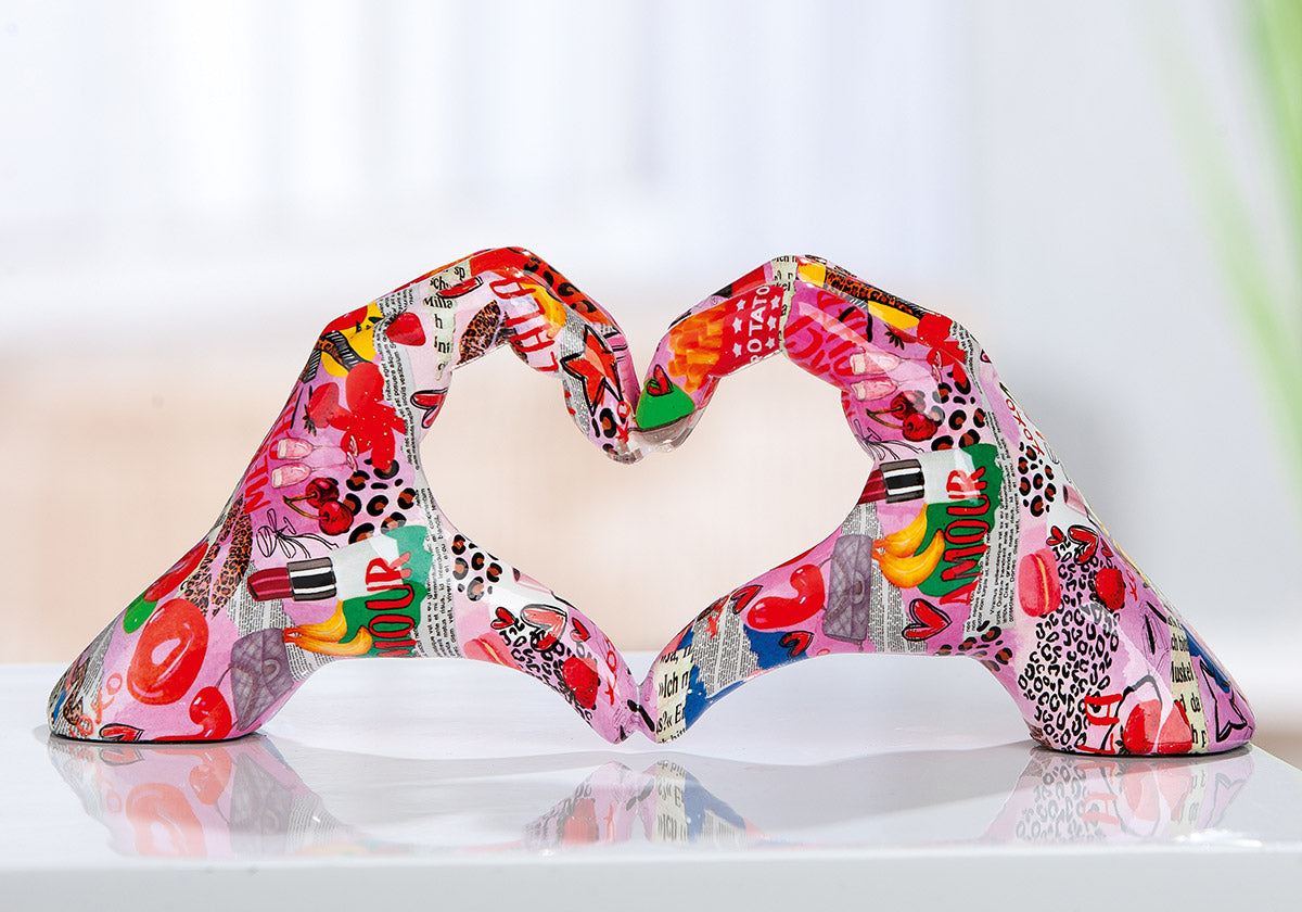Decorative Gilde Heart Ooh Lala hand motif object with intricate design, ideal for home decor accents.