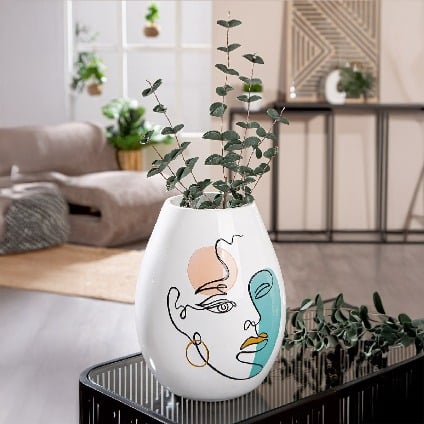 White Gilde vase with a bulbous face motif, made of resin, standing 28cm tall, featuring artistic facial details.