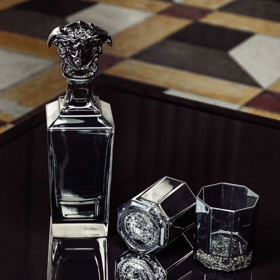Pair of Versace Medusa Lumiere crystal tumblers, 9cm, featuring detailed Medusa designs and elegant crystal craftsmanship.