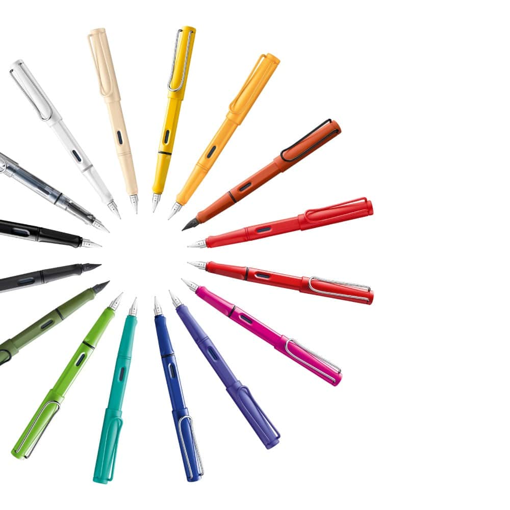 Lamy Safari fountain pen with blue barrel and silver clip, featuring a clear grip section and smooth writing nib.