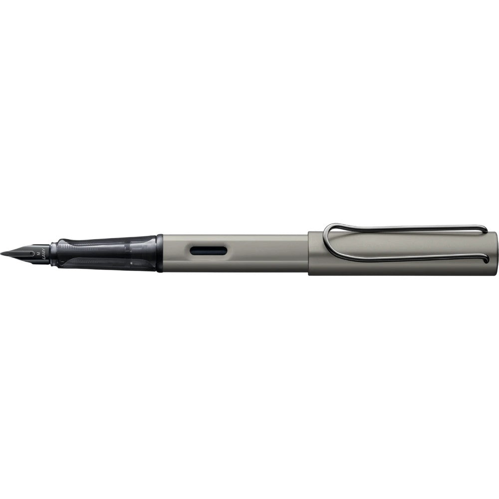 Lamy Lx fountain pen with sleek design and metallic finish, shown with cap and fine nib.