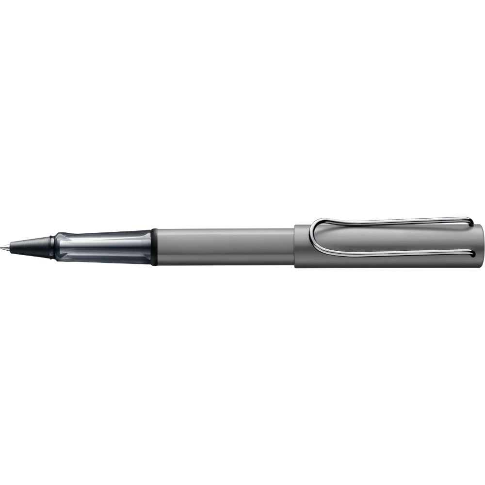 Lamy AL-star rollerball pen with silver aluminum body and black grip, featuring a sleek modern design and metal clip.