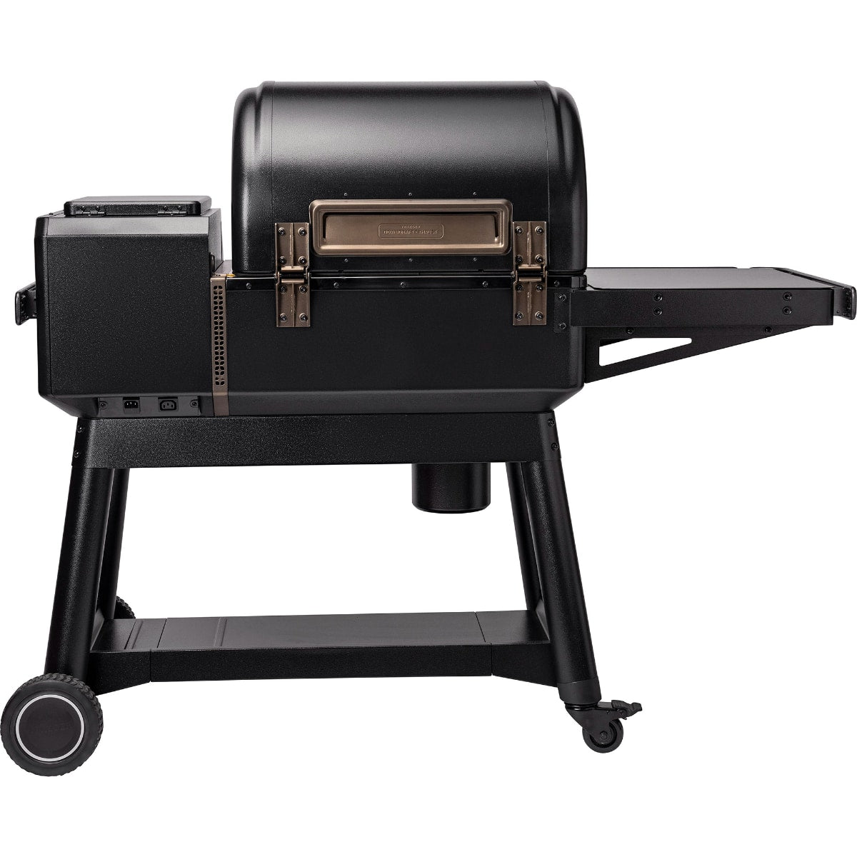 Traeger Ironwood wood pellet grill with stainless steel lid and control panel, outdoor cooking appliance for grilling and smoking.