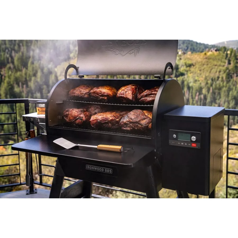 Traeger Ironwood 885 wood pellet grill with stainless steel construction and digital control panel for outdoor cooking